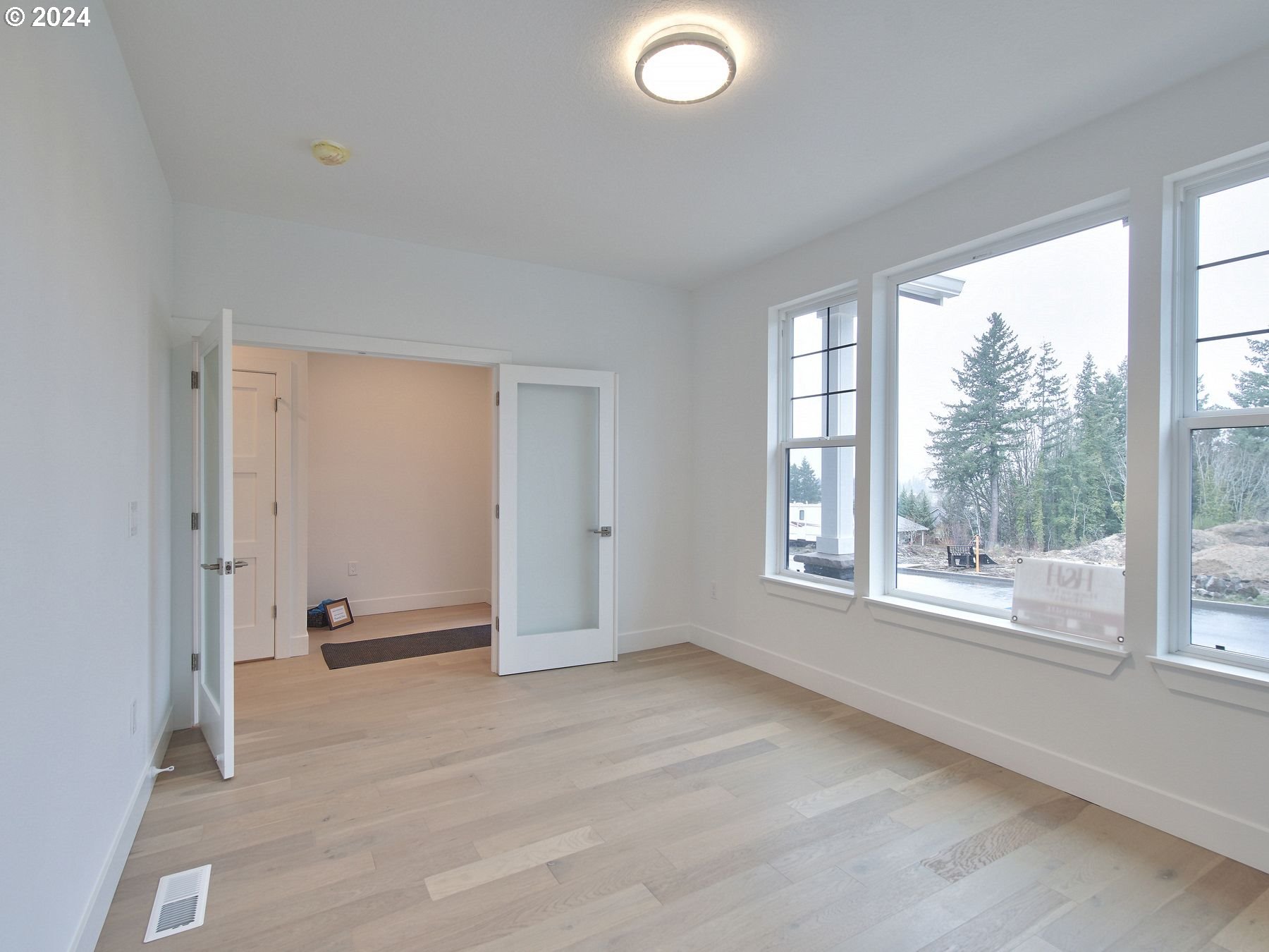 365 Northeast Oakview Drive Estacada, OR 97023 - Photo 4 of 39 a view of an empty room with a window