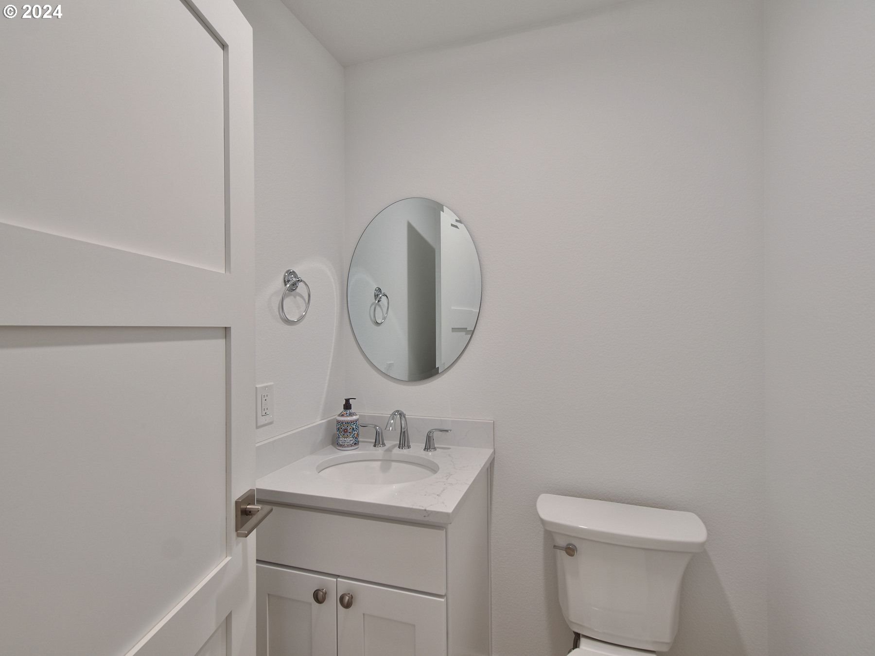 365 Northeast Oakview Drive Estacada, OR 97023 - Photo 5 of 39 a bathroom with a toilet sink and mirror