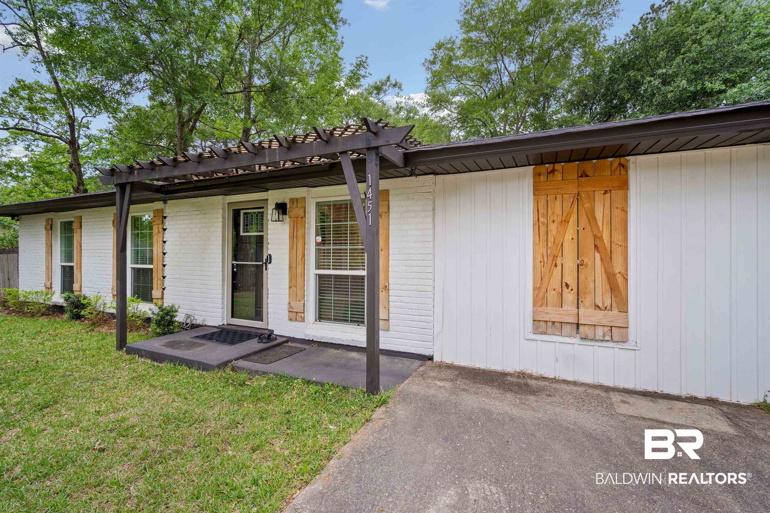 1451 West Morlee Drive Mobile, AL 36618 - Photo 3 of 30 Single story home with a pergola, a front lawn, and brick siding