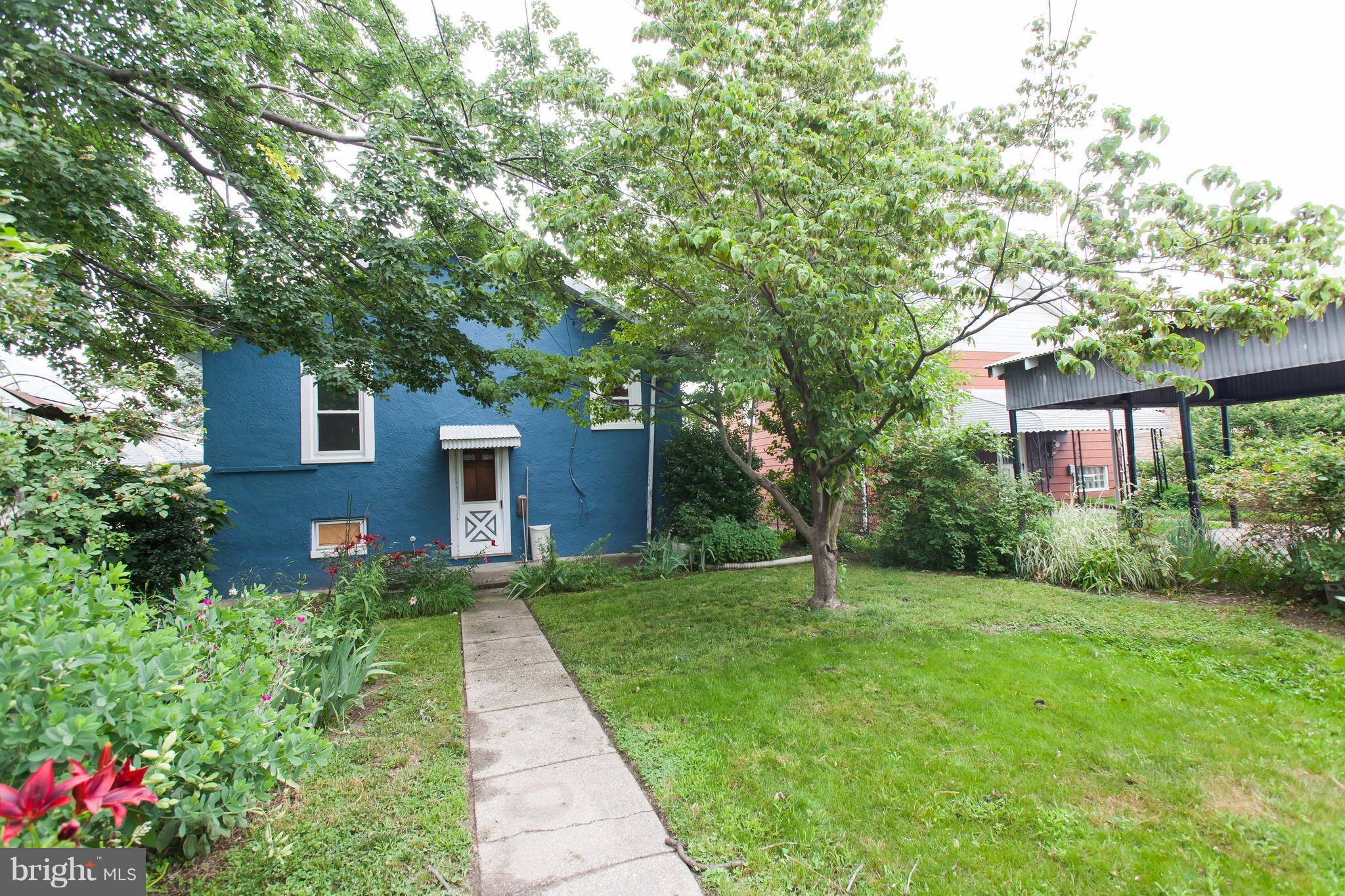 6907 Ridgeway Road Baltimore, MD 21222 - Photo 22 of 25 a house view with a garden space