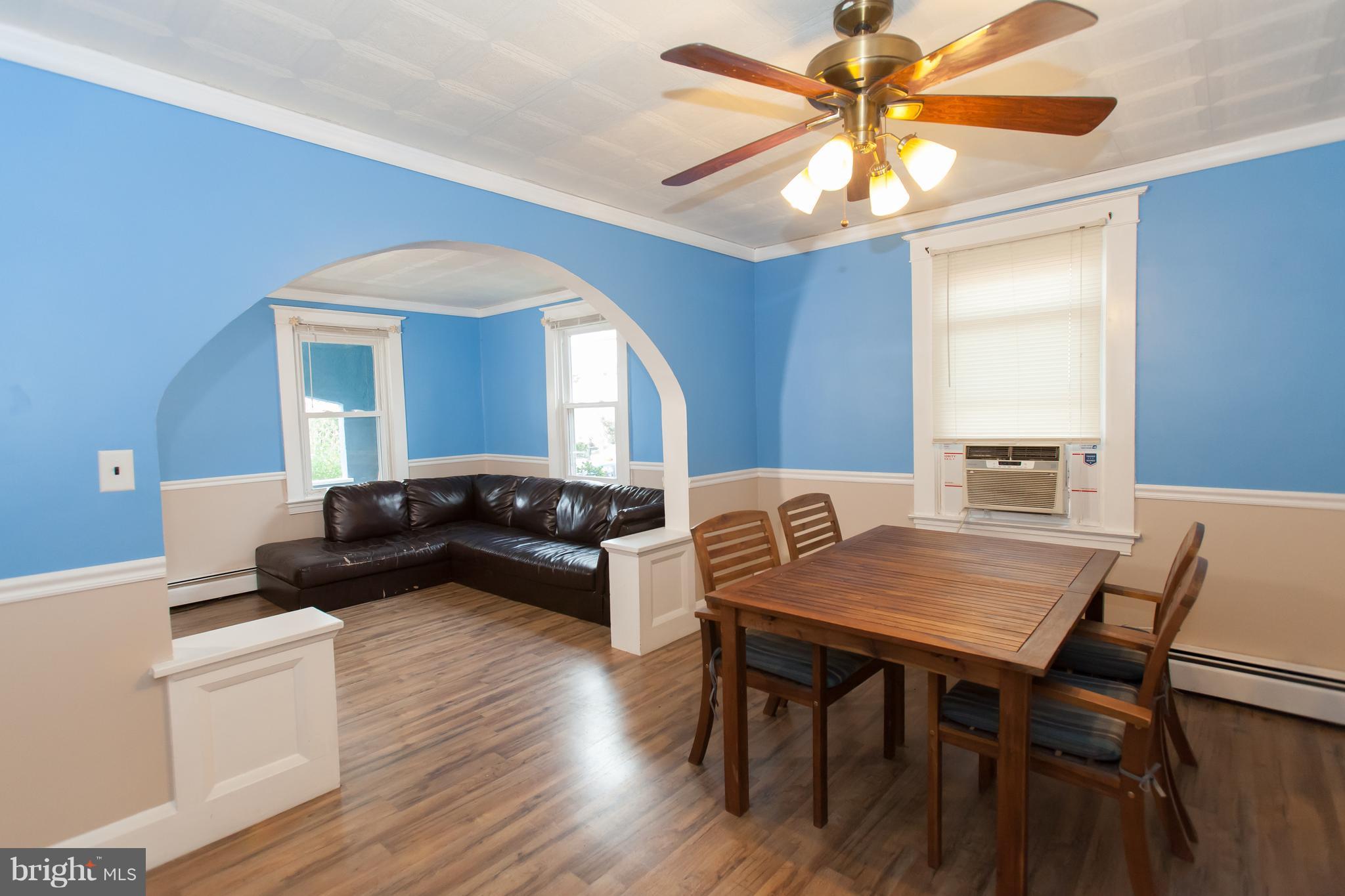 6907 Ridgeway Road Baltimore, MD 21222 - Photo 8 of 25 a living room with furniture and a table