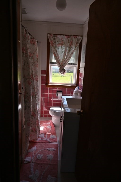 16 Charles Hill Road Holyoke, MA 01040 - Photo 11 of 27 a bathroom with a bathtub and a toilet