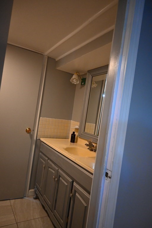 16 Charles Hill Road Holyoke, MA 01040 - Photo 24 of 27 a bathroom with a sink and mirror