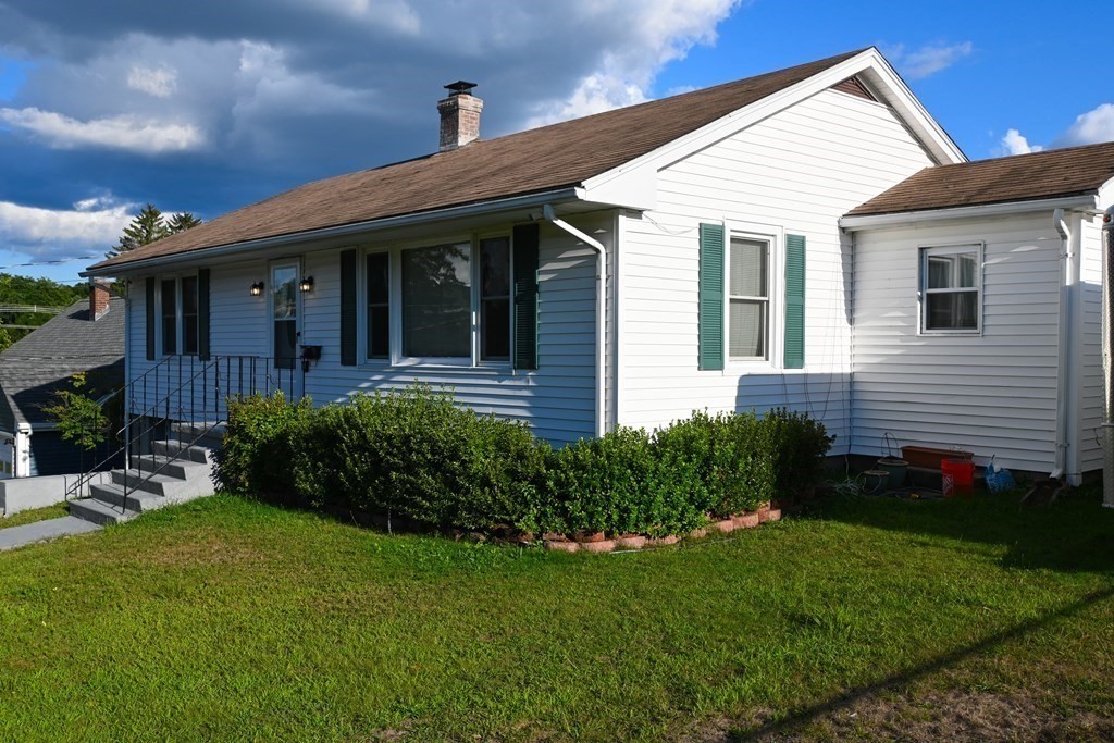 16 Charles Hill Road Holyoke, MA 01040 - Photo 3 of 27 a front view of a house with a yard