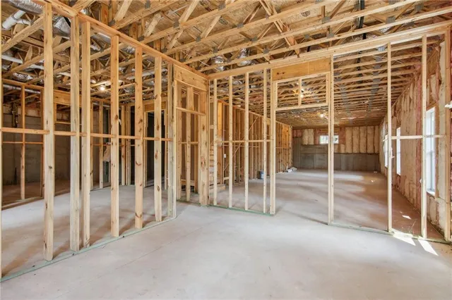 a view of a room with wooden walls