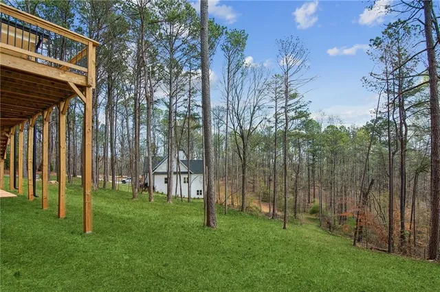 a view of a deck with a backyard