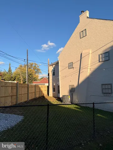 a view of a street with an outdoor space