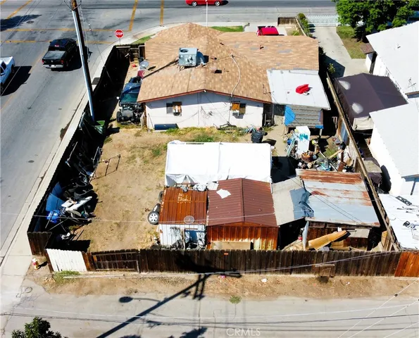 an aerial view of a house with swimming pool