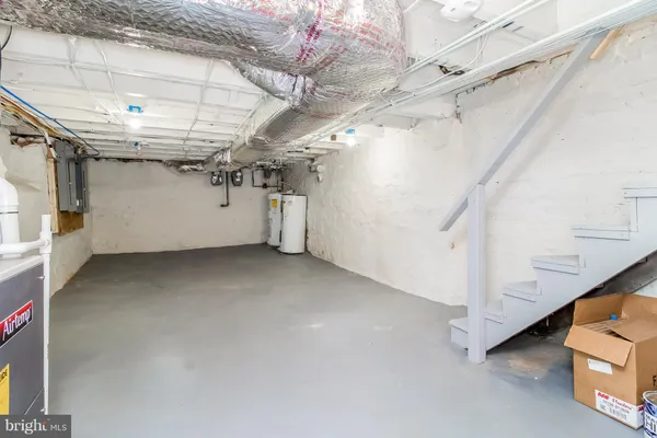 a utility room with cabinets