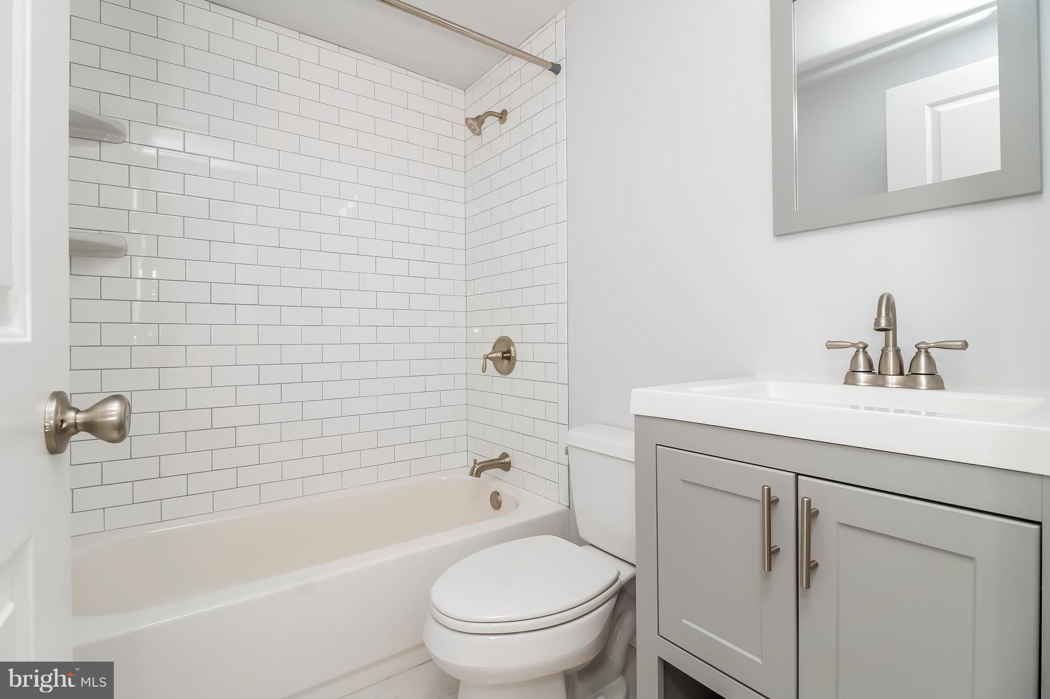 17 State Road, Unit B Media, PA 19063 - Photo 8 of 19 a bathroom with a sink toilet and shower