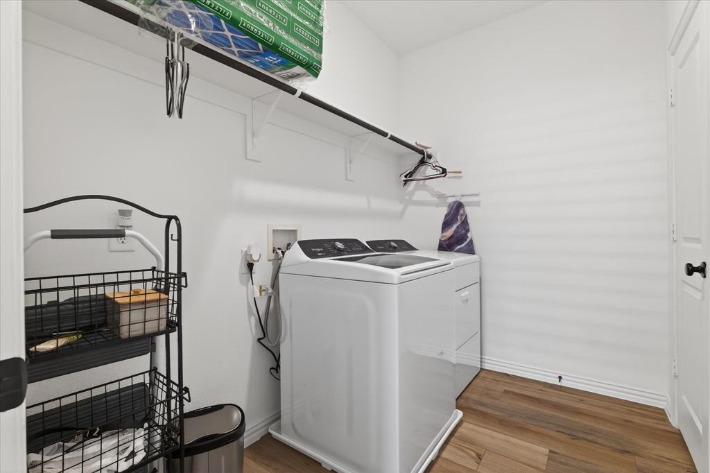 3038 Opera Way Sachse, TX 75048 - Photo 19 of 31 a utility room with dryer and washer