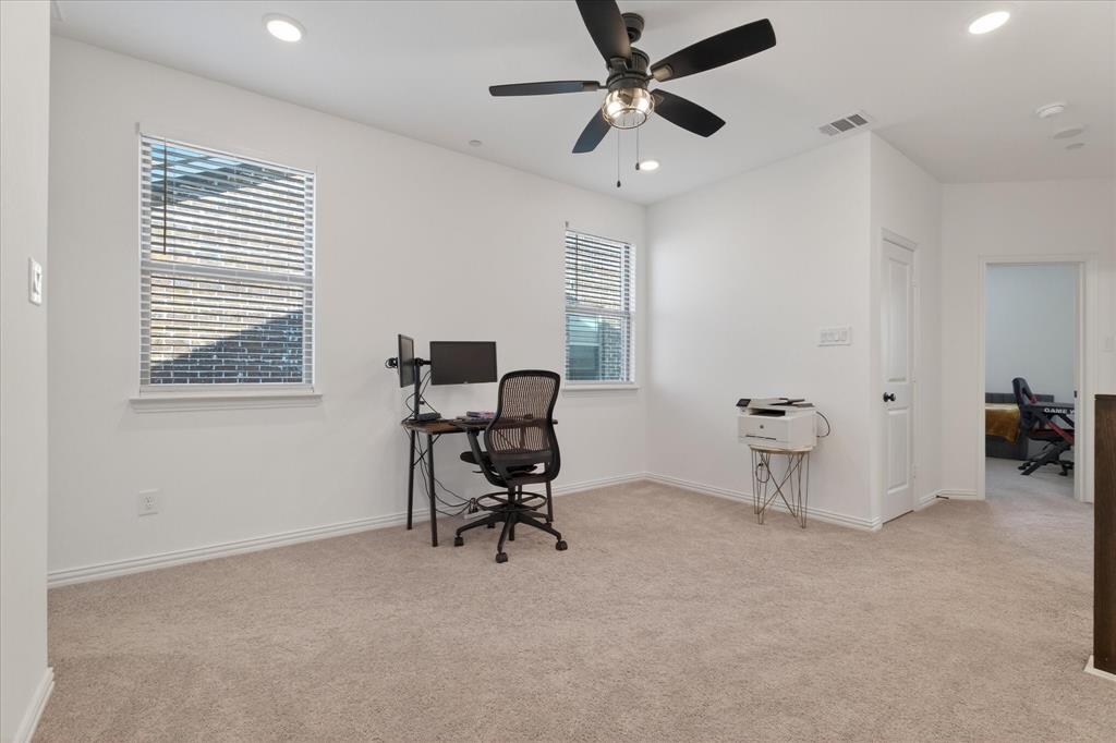 3038 Opera Way Sachse, TX 75048 - Photo 21 of 31 a view of a workspace with furniture and a window