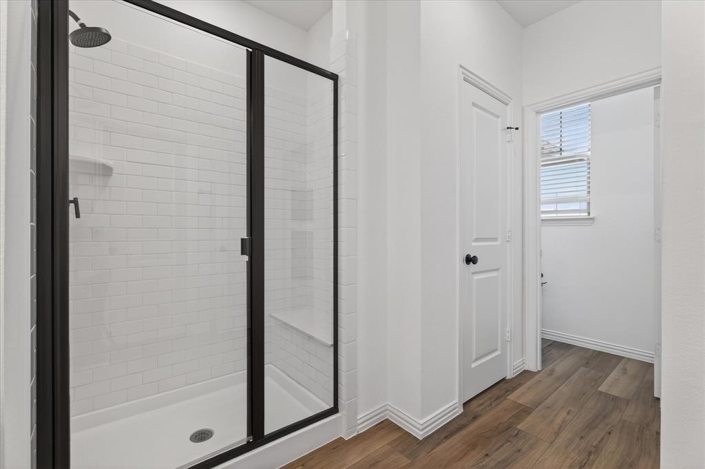 3038 Opera Way Sachse, TX 75048 - Photo 26 of 31 a view of a bathroom with wooden floor