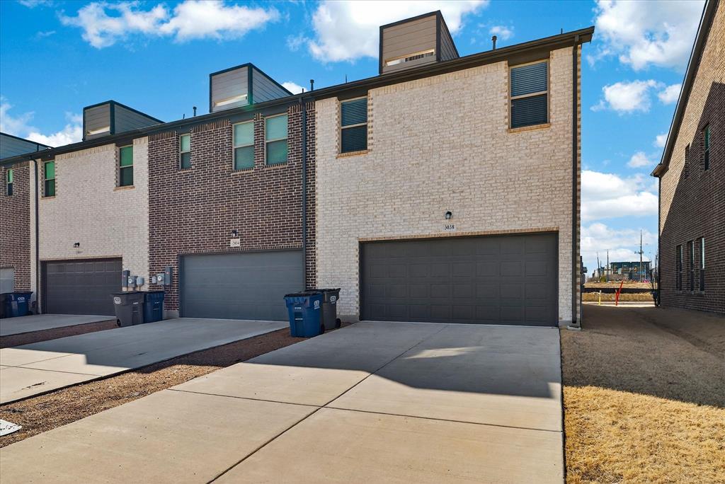 3038 Opera Way Sachse, TX 75048 - Photo 29 of 31 a front view of a house with a yard