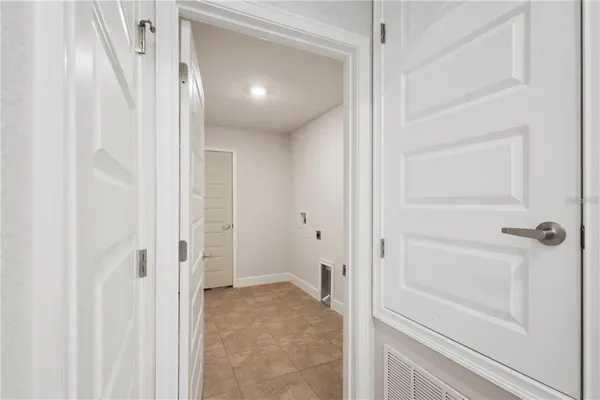a bathroom with a granite countertop bathtub sink and shower