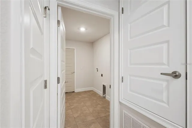 a bathroom with a granite countertop bathtub sink and shower