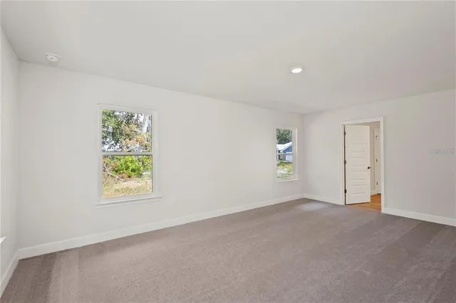 a view of a golf course with green space