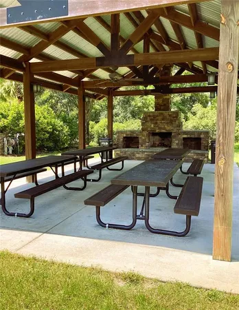 a view of a swimming pool with a yard