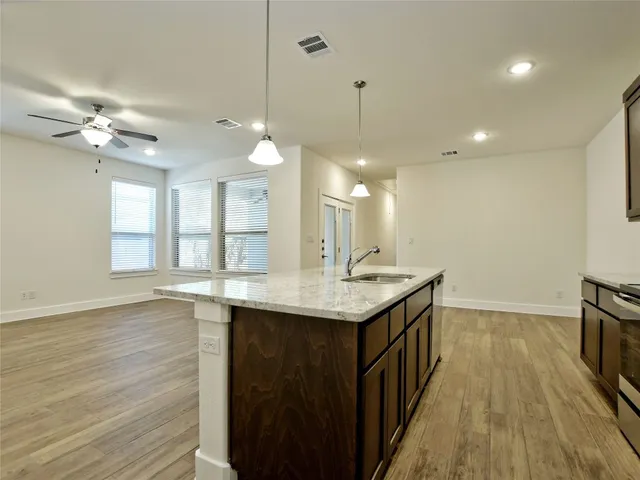 a view of storage and utility room with washer and dryer