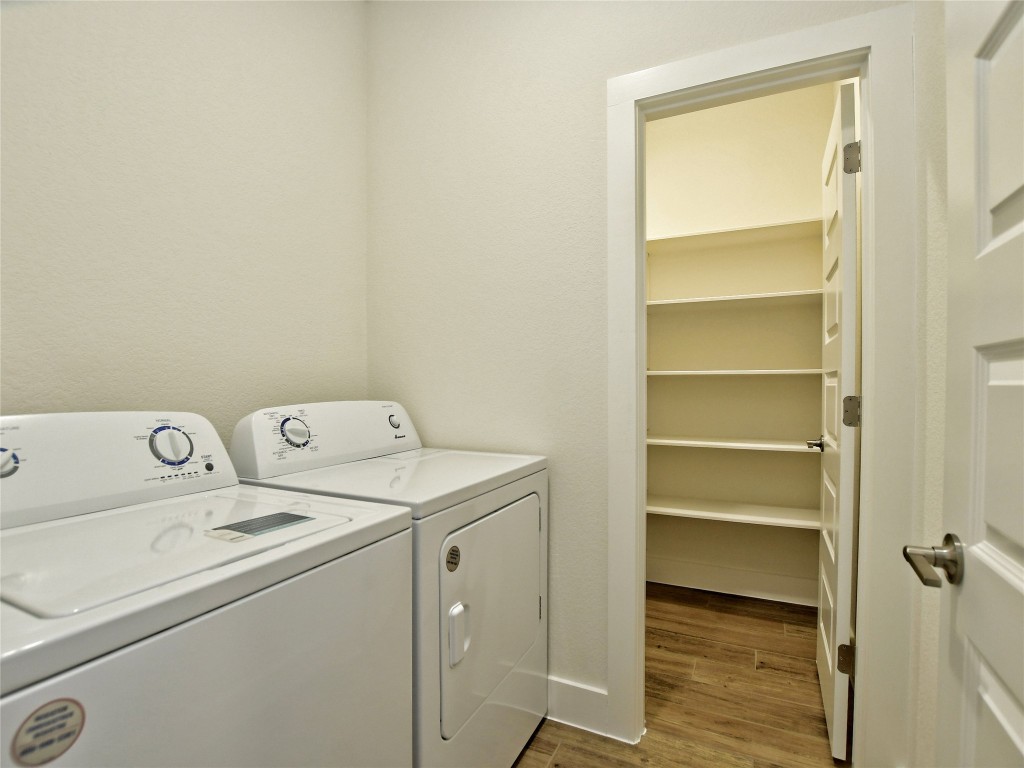 402 Parkline Drive, Unit 24A Georgetown, TX 78626 - Photo 15 of 27 a view of storage and utility room with washer and dryer