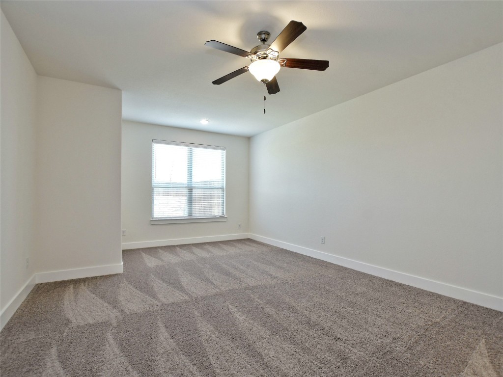 402 Parkline Drive, Unit 24A Georgetown, TX 78626 - Photo 16 of 27 a view of an empty room with a window