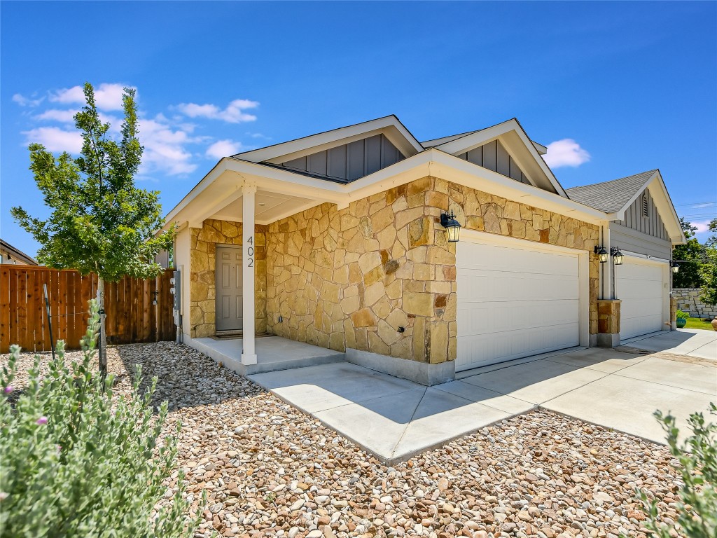 402 Parkline Drive, Unit 24A Georgetown, TX 78626 - Photo 2 of 27 a front view of a house with a yard