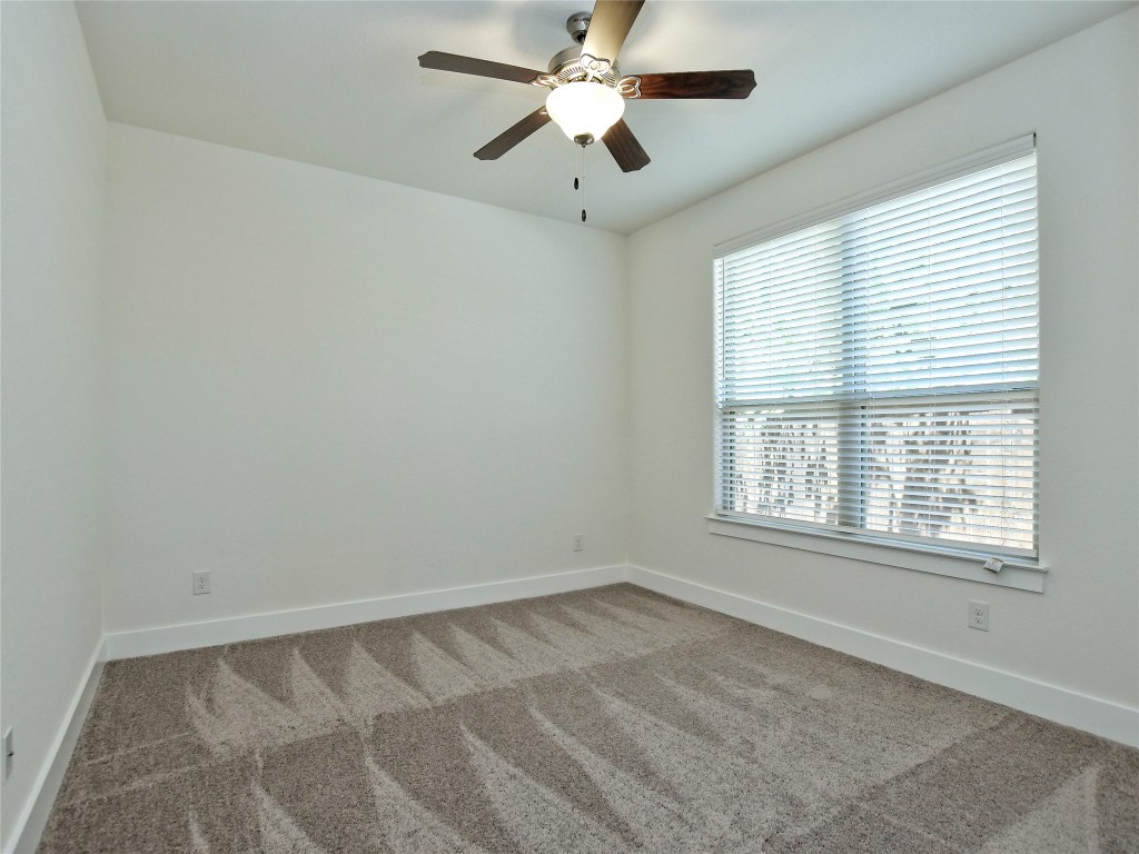 402 Parkline Drive, Unit 24A Georgetown, TX 78626 - Photo 22 of 27 a view of an empty room with a window