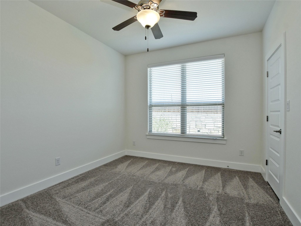 402 Parkline Drive, Unit 24A Georgetown, TX 78626 - Photo 24 of 27 a view of an empty room with a window