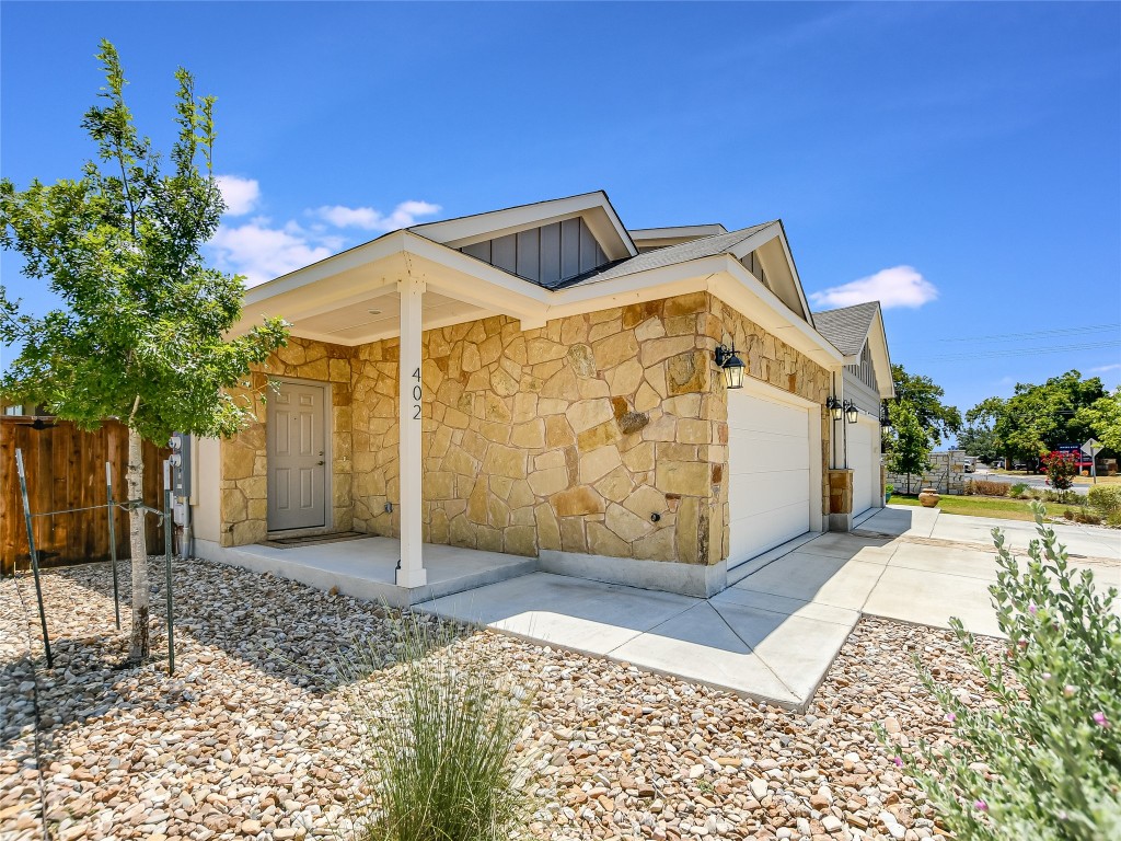 402 Parkline Drive, Unit 24A Georgetown, TX 78626 - Photo 3 of 27 a front view of a house with a yard