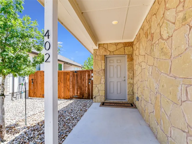 a view of a house with a street