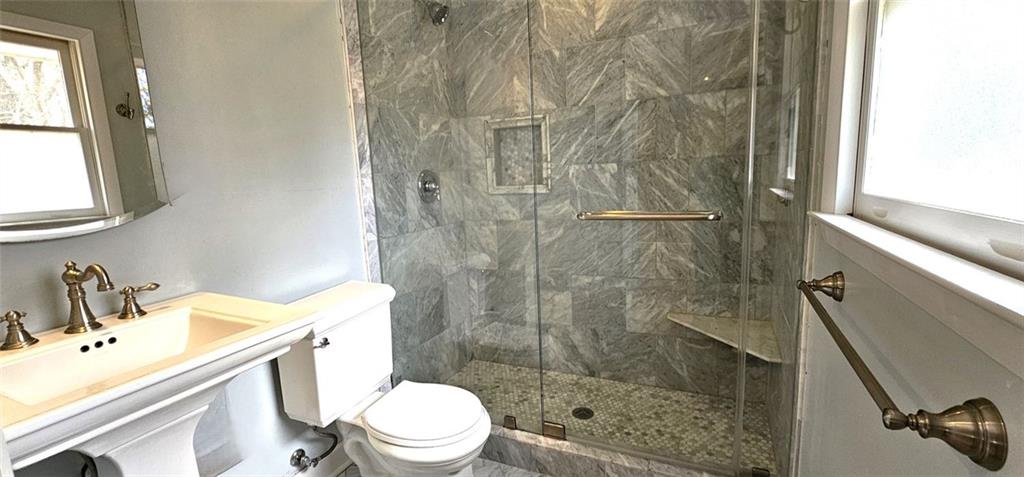 2633 Mural Drive Chamblee, GA 30341 - Photo 14 of 15 a bathroom with a sink toilet and shower