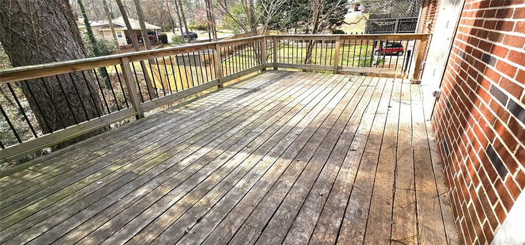 2633 Mural Drive Chamblee, GA 30341 - Photo 15 of 15 a view of balcony with wooden floor