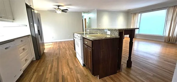 a bathroom with a sink a mirror and a bathtub