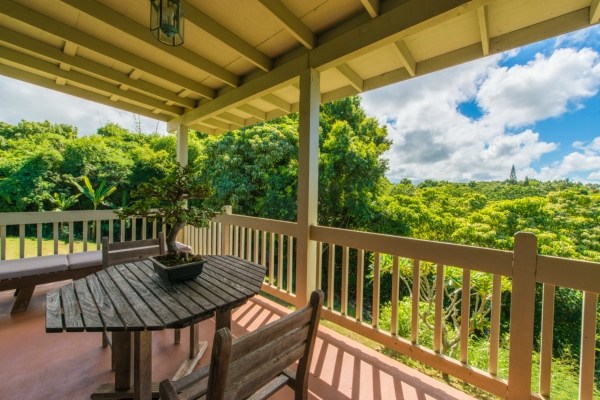 7561 Koolau Road, Unit B Kilauea, HI 96754 - Photo 20 of 25 a view of a balcony with furniture