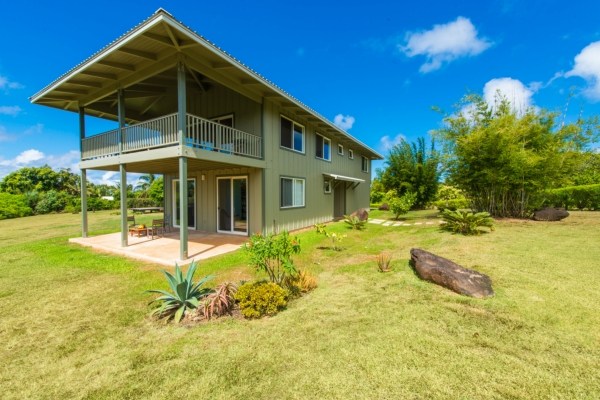 7561 Koolau Road, Unit B Kilauea, HI 96754 - Photo 2 of 25 a view of a house with backyard and sitting area