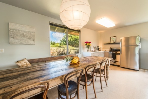 7561 Koolau Road, Unit B Kilauea, HI 96754 - Photo 21 of 25 a dining room with furniture and window
