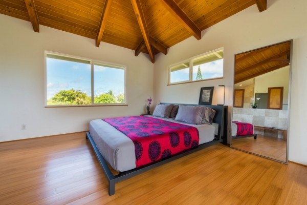7561 Koolau Road, Unit B Kilauea, HI 96754 - Photo 6 of 25 a bedroom with a bed and window