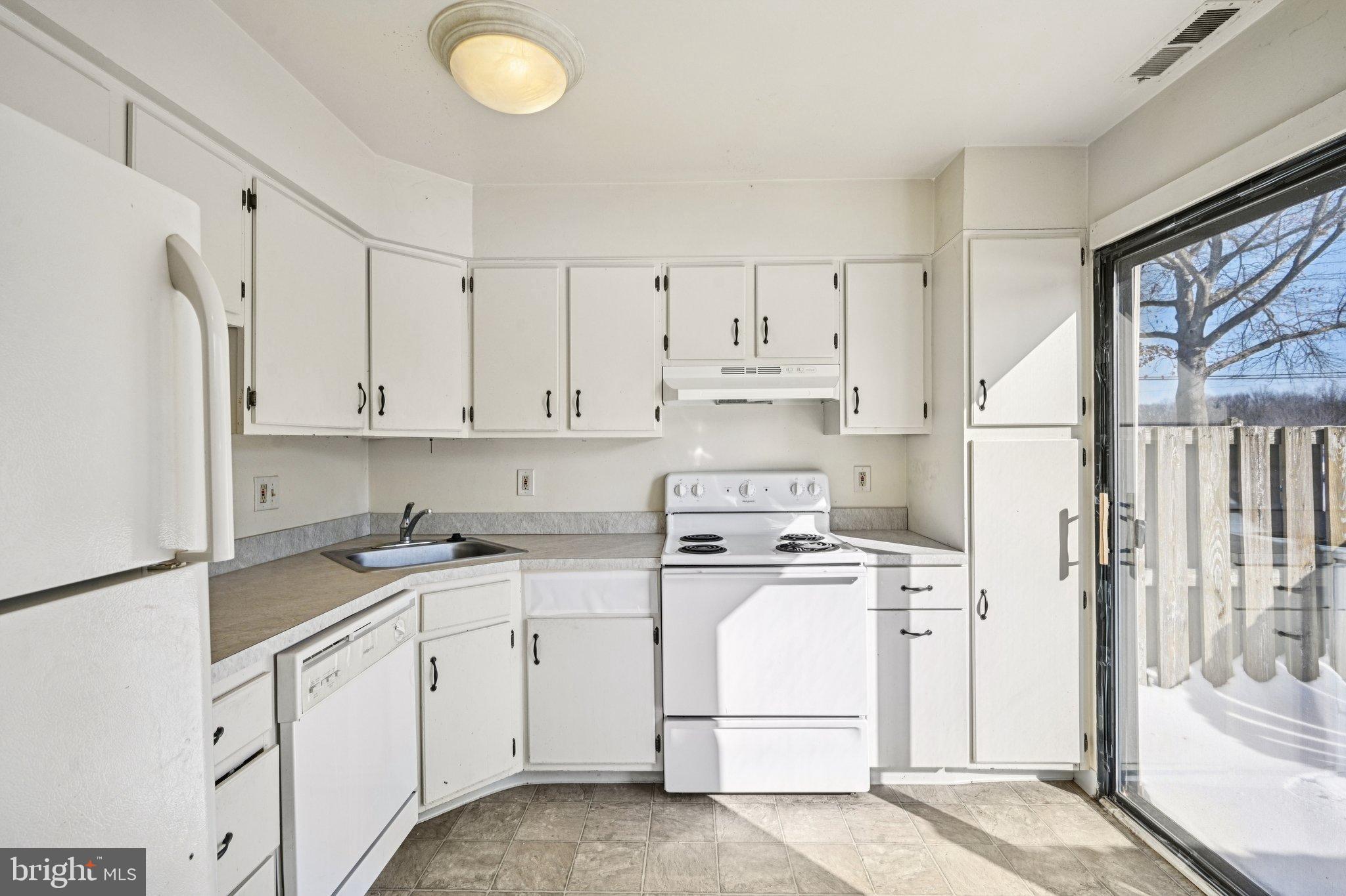 50 Centennial Road Telford, PA 18969 - Photo 13 of 38 Bright and airy kitchen with outdoor access.