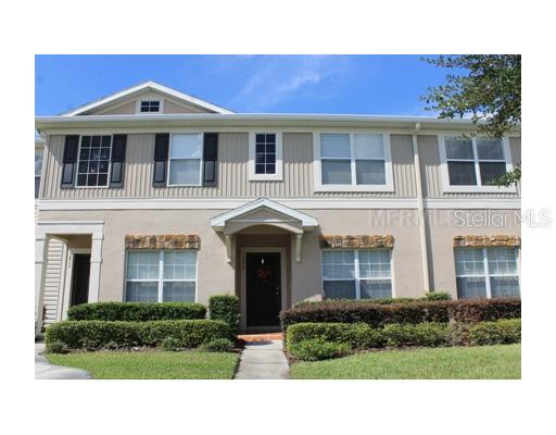5809 Fishhawk Ridge Drive Lithia, FL 33547 - Photo 1 of 1 a front view of a house with a yard