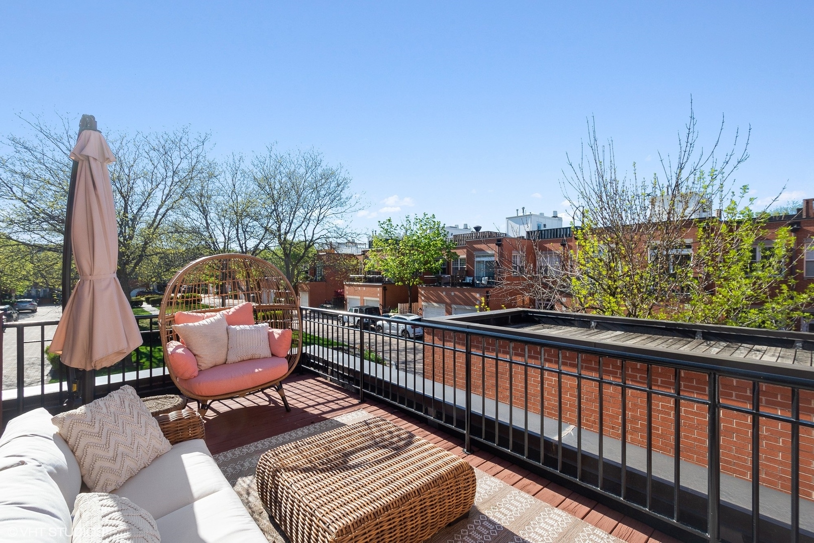 220 West Scott Street, Unit F Chicago, IL 60610 - Photo 18 of 19 a view of a chairs and table in patio with wooden fence