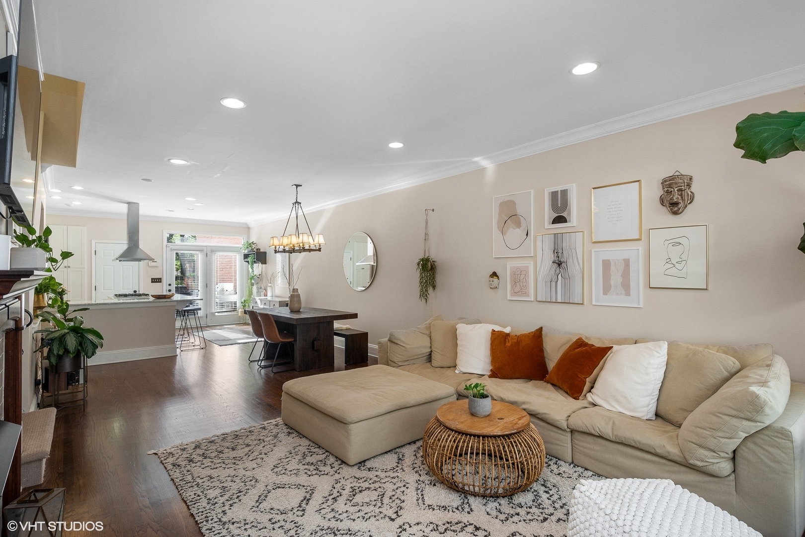 220 West Scott Street, Unit F Chicago, IL 60610 - Photo 3 of 19 a living room with furniture and a chandelier