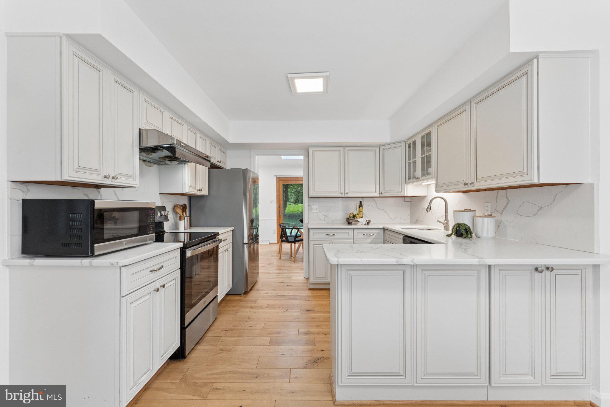 3219 Fox Mill Road Oakton, VA 22124 - Photo 24 of 87 Modern kitchen with sleek finishes.