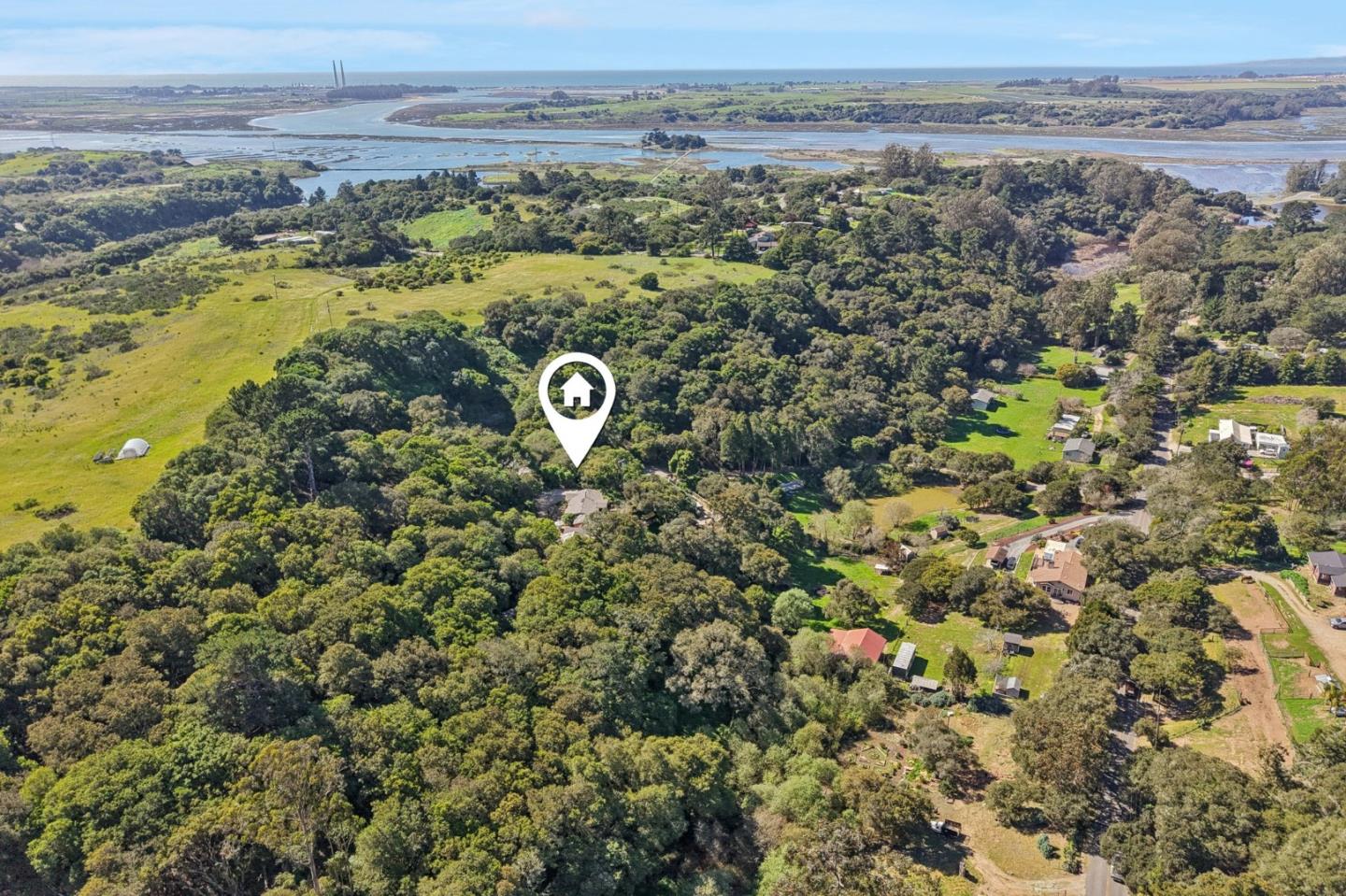 122 Strawberry Road Watsonville, CA 95076 - Photo 38 of 57 an aerial view of a house with a lake view