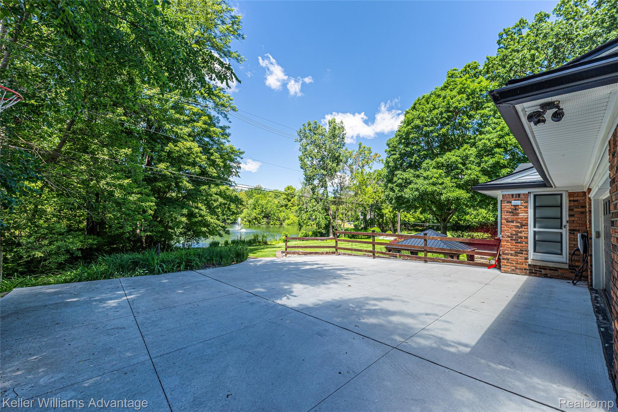 5722 Raven Road Bloomfield Hills, MI 48301 - Photo 4 of 34 Expansive concrete patio offering ample outdoor space