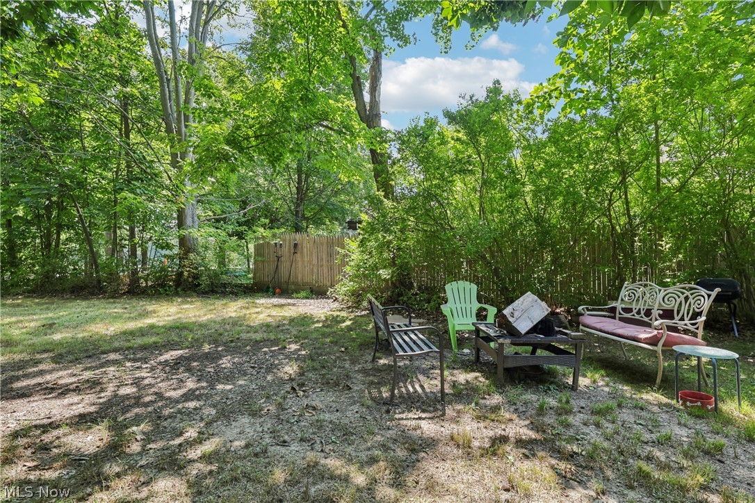 105 Hartzell Road North Benton, OH 44449 - Photo 17 of 33 View of treed back yard