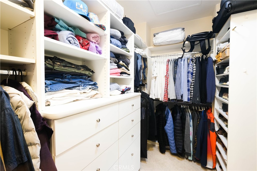 3 Avenida Cristal San Clemente, CA 92673 - Photo 18 of 36 a view of walk in closet with clothes and shoes