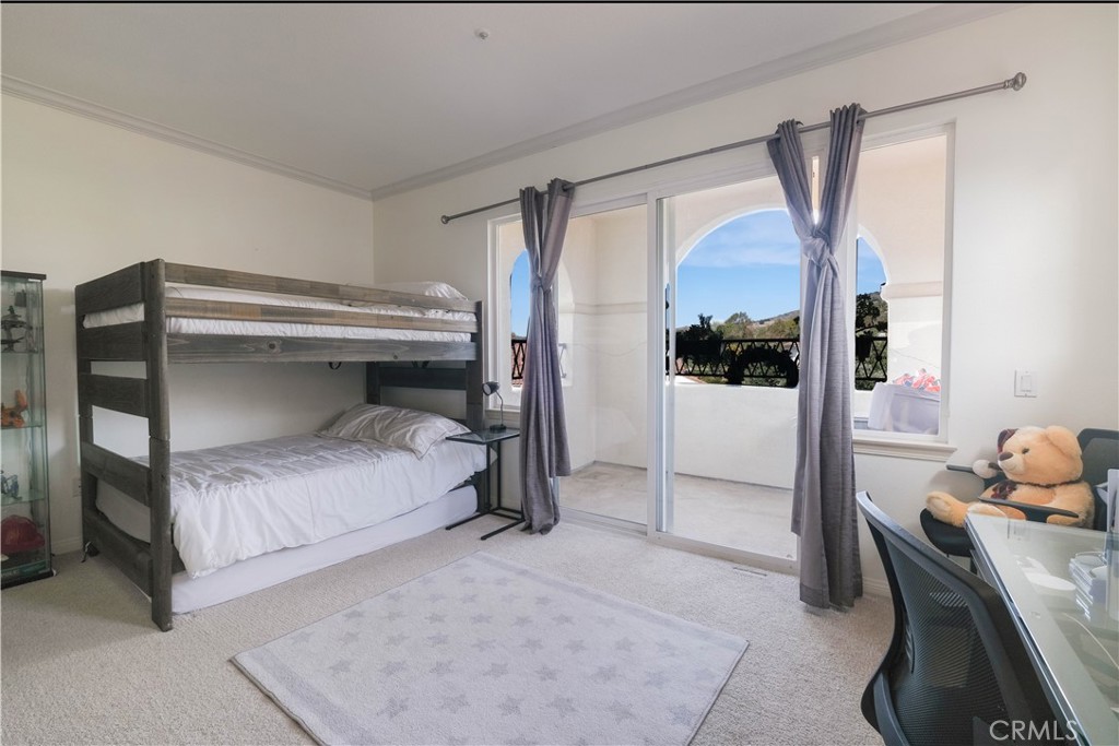3 Avenida Cristal San Clemente, CA 92673 - Photo 21 of 36 a bedroom with a bed and a mirror