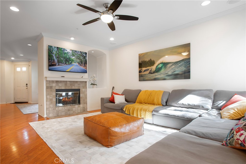 3 Avenida Cristal San Clemente, CA 92673 - Photo 6 of 36 a living room with furniture and a fireplace