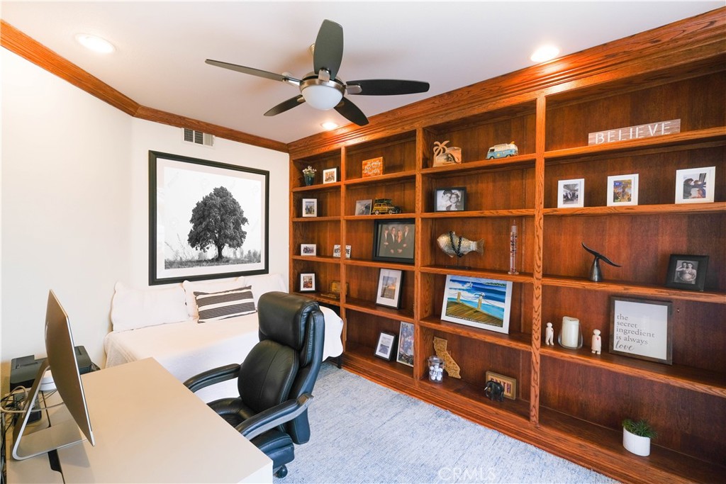 3 Avenida Cristal San Clemente, CA 92673 - Photo 7 of 36 a workspace with a bookshelf