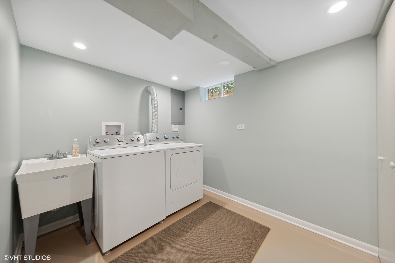 186 West Burlington Street Riverside, IL 60546 - Photo 12 of 19 a utility room with a sink dryer and washer